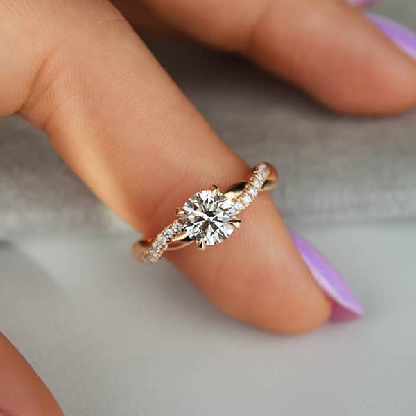 auksinis ziedas su deimantais